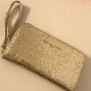 Wristlet with charger inside